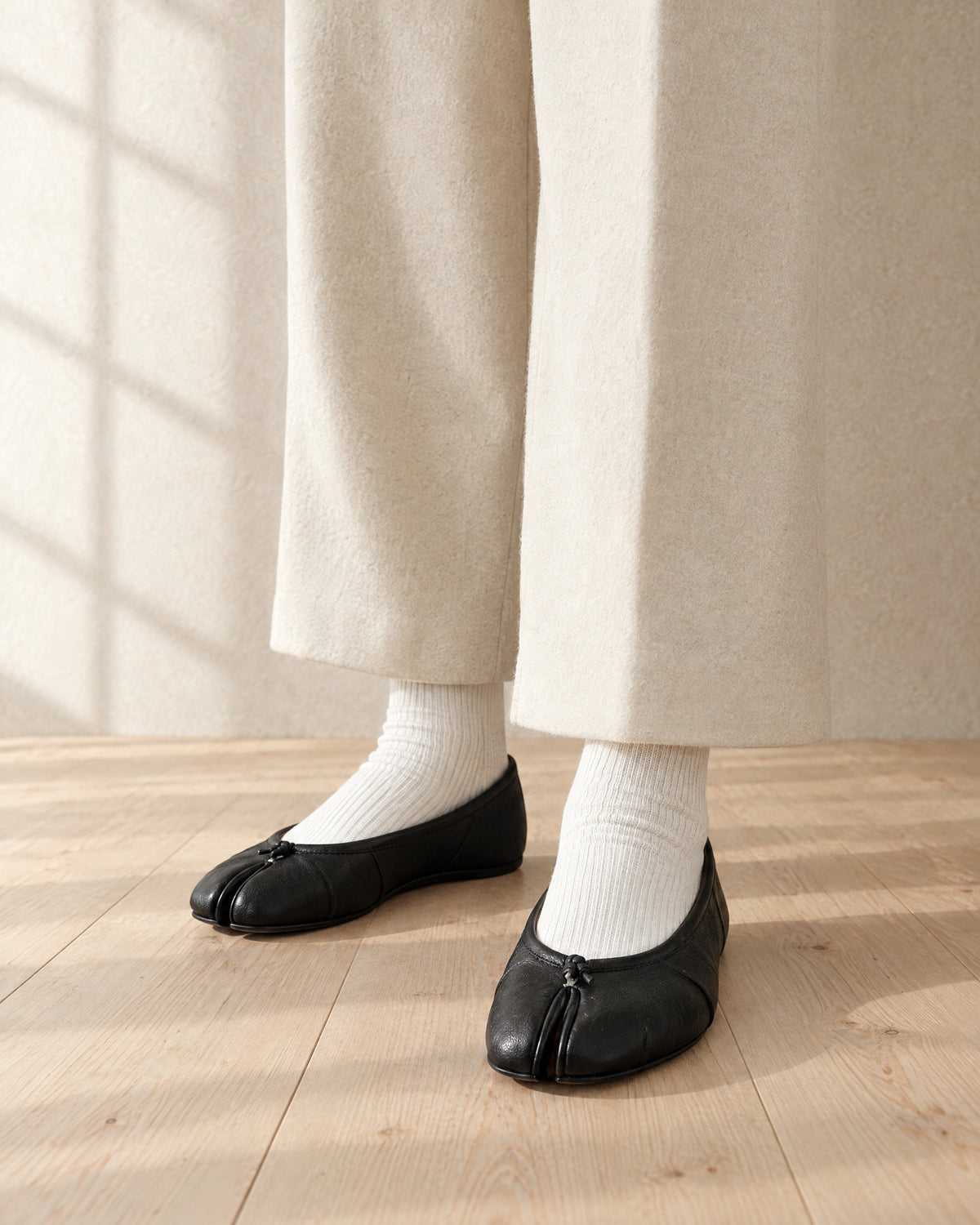 Black Tabi Flats worn with white Tabi Socks