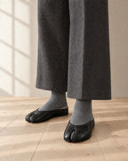 Black Tabi Mules Gion worn with grey Tabi Socks